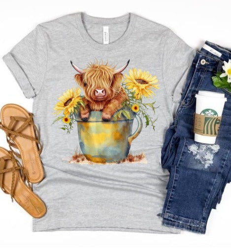 Highland Cow and sunflower