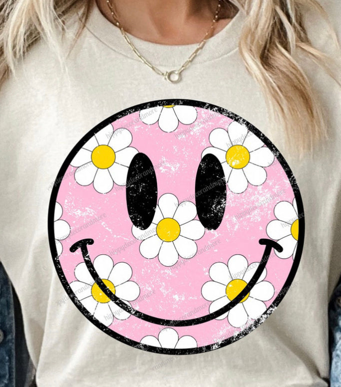 Pink smiling face with daisys white